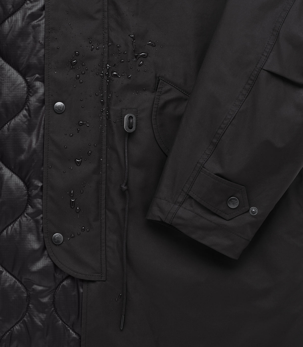 K.P. Dry-Wax PrimaLoft Fishtail Coat in Black